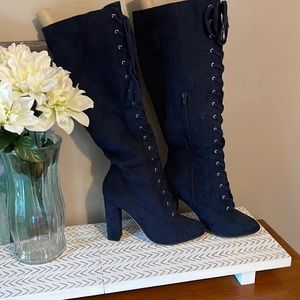 Tall lace up blue suede heeled boots